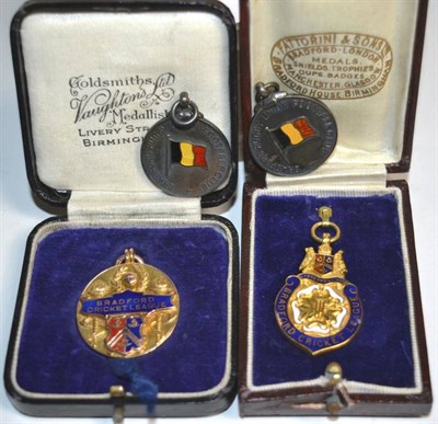 Lot 116 - Two 9 carat gold and enamel Bradford cricket league medals, both awarded 1929 and two Bradford...