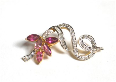 Lot 120 - A diamond and pink stone scroll pendant, total estimated diamond weight 0.45 carat...