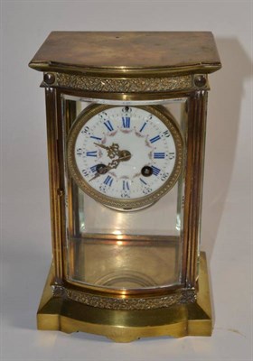 Lot 127 - A brass four glass striking mantle clock