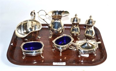 Lot 128 - A matched silver five piece condiment set, Adie Bros, Birmingham 1957 and Barnards, London...