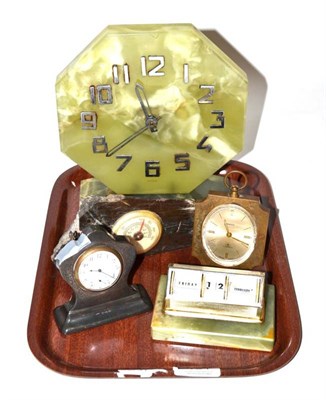 Lot 131 - A silver desk timepiece together with a green onyx timepiece with later electronic movement; a...