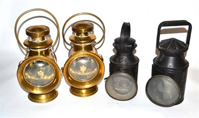 Lot 133 - A pair of H&B brass side lamps; a Polkey lamp and one other similar (4)
