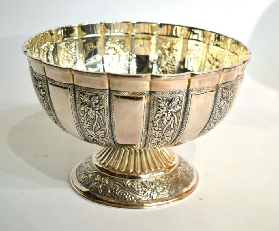 Lot 134 - A silver pedestal bowl, C J Vander, Sheffield 2005, of good gauge, fluted and decorated with...