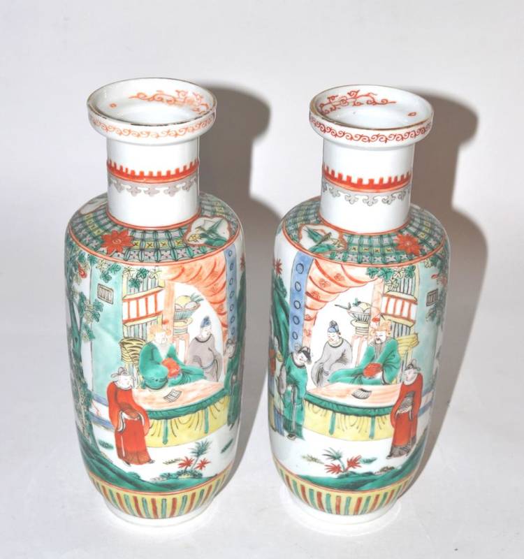 Lot 136 - A pair of Chinese famille verte porcelain rouleau vases, 25.5cm high
