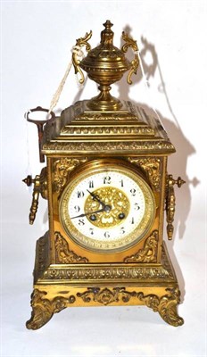 Lot 139 - A late 19th century brass cased clock with Arabic dial and eight day striking movement