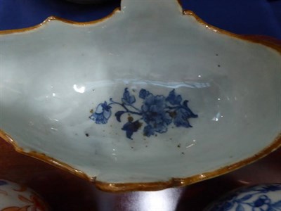 Lot 153 - A Chinese export sauce boat; a bullet shaped teapot and a Chinese Imari teapot (3)