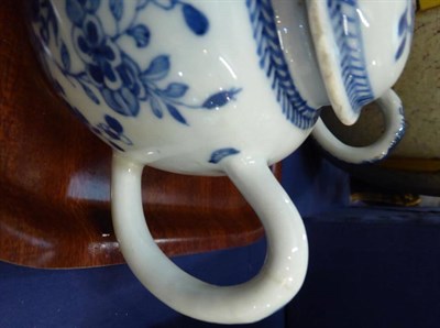 Lot 153 - A Chinese export sauce boat; a bullet shaped teapot and a Chinese Imari teapot (3)
