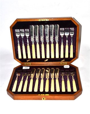 Lot 157 - A late Victorian silver bladed twelve piece fish knife and fork set, James Dixon and Sons,...