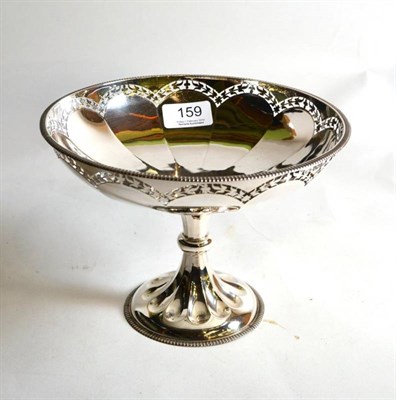 Lot 159 - A silver pedestal bowl, Fattorini & Sons, Sheffield 1923, with foliate pierced rim and fluted...