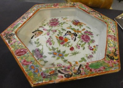 Lot 165 - A Chinese Canton porcelain hexagonal jardiniere and stand