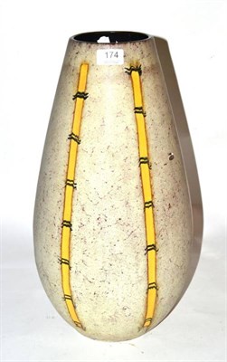Lot 174 - A ceramic vase with yellow stripe detail