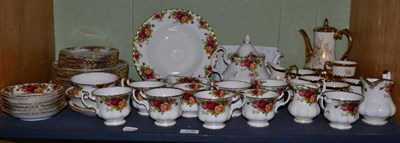 Lot 176 - A Country Roses tea service and a Staffordshire coffee set