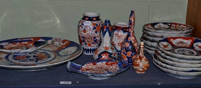 Lot 195 - A large quantity of Japanese Imari porcelain plates and vases