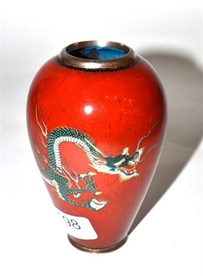 Lot 198 - An cloisonne enamel vase decorated with a dragon curled around a red background