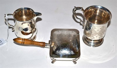 Lot 200 - A Victorian silver christening mug, Birmingham 1868; a small silver cream jug, London 1934; and...