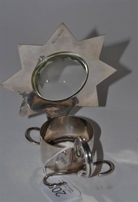 Lot 208 - A Hukin and Heath silver plated lamp/chamberstick, with convex glass magnifier within a star shaped