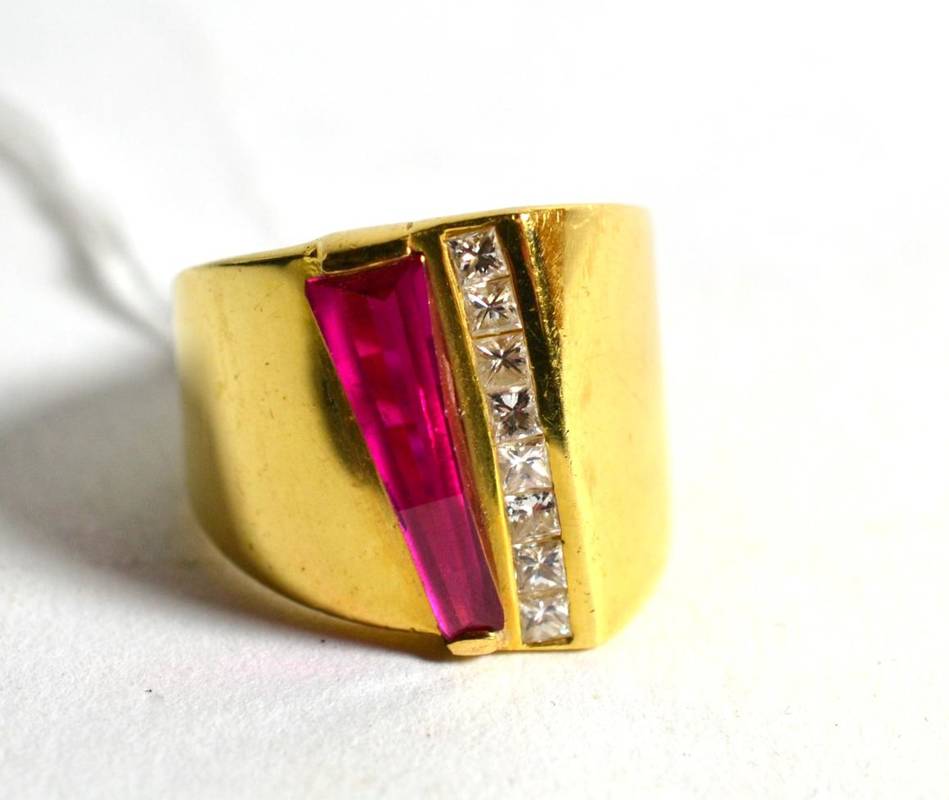 Lot 229 - A ruby and princess cut diamond dress ring, finger size S/12, stamped '750', 11.4g
