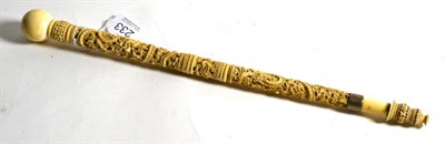 Lot 233 - A Chinese carved ivory parasol handle, late 19th century, dragon, bird and butterfly design,...