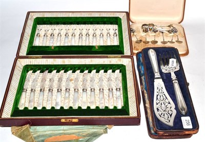 Lot 256 - A cased set of fruit knives and forks, twelve settings, silver ferrules, mother of pearl...