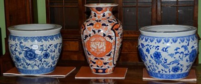 Lot 261 - Two similar Chinese blue and white porcelain jardinieres; and a large Japanese Imari baluster...