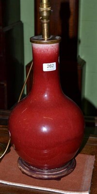 Lot 262 - A Chinese sang de boeuf porcelain bottle vase table lamp