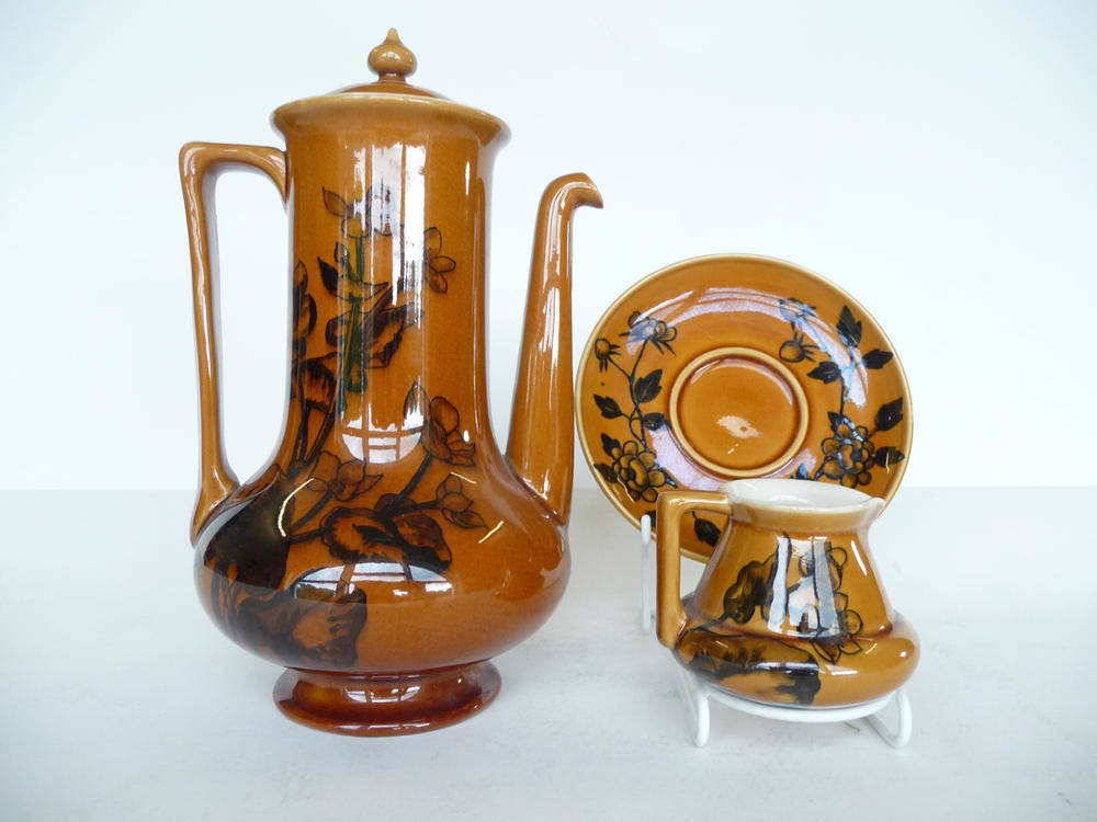 Lot 1794 - A Linthorpe Pottery Coffee Pot and Cover, shape No.646, designed by Christopher Dresser, painted by