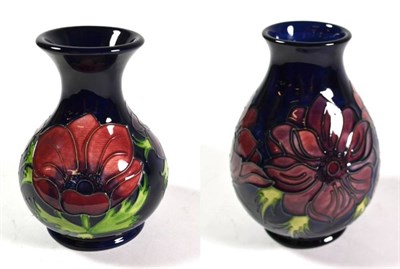 Lot 3 - A Moorcroft pottery Anemone pattern vase, with painted and impressed marks, 19cm high; together...