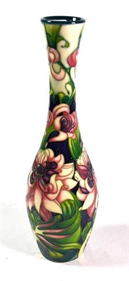Lot 11 - A modern Moorcroft pottery vase by Emma Bossons, decorated with pink flowers, limited edition...