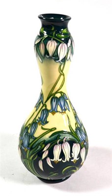 Lot 13 - A modern Moorcroft pottery Combermere pattern vase by Rachel Bishop, painted and impressed...