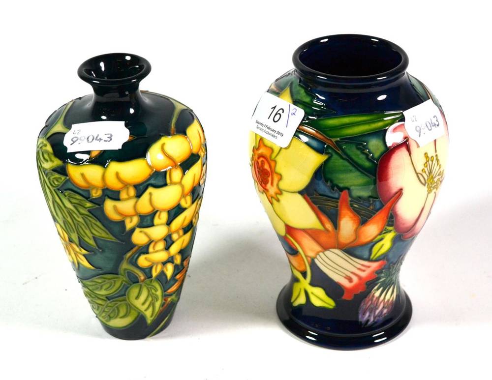 Lot 16 - A modern Moorcroft pottery Yellow Wysteria pattern vase by Philip Gibson, numbered 694, painted and