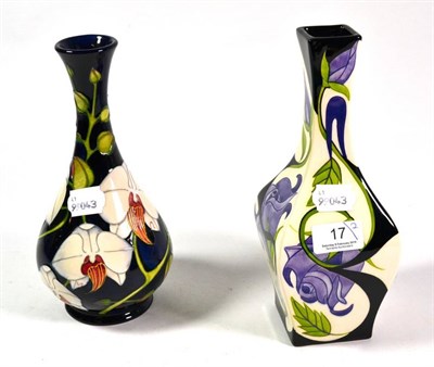 Lot 17 - A modern Moorcroft pottery Chatsworth Orchid pattern vase by Philip Gibson, numbered 350, with...