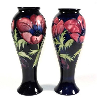 Lot 21 - A pair of Moorcroft pottery Anemone pattern vases, with painted and impressed marks, 27.5cm...