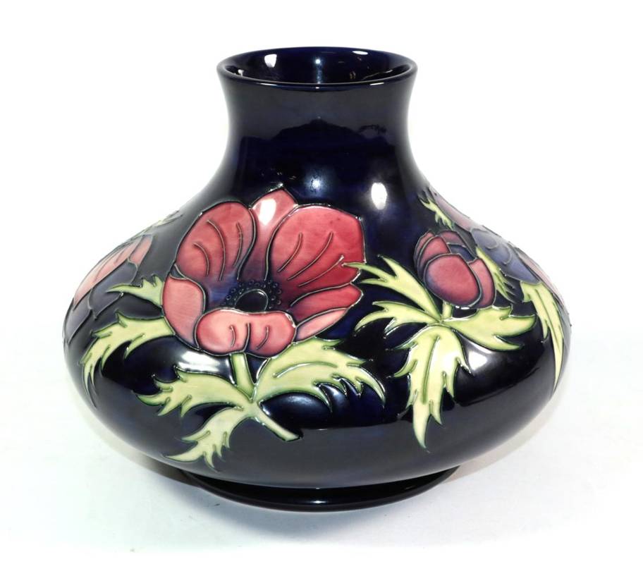 Lot 29 - A Moorcroft pottery Anemone pattern vase, painted and impressed marks, also gold signature for John