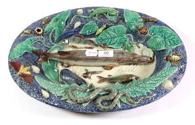Lot 50 - A late 19th century continental Palissy style oval dish decorated with fish, insects, and leaf...