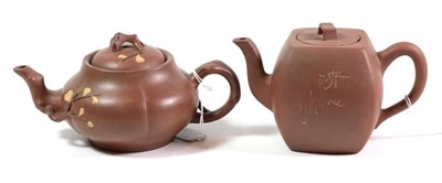 Lot 51 - A Yixing stoneware teapot and cover, Qing Dynasty, of fluted oval form with crabstock spout and...