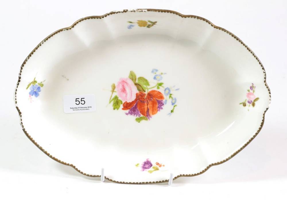 Lot 55 - A Swansea porcelain oval dish, circa 1820, painted with a flowerspray and scattered sprigs within a