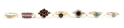Lot 73 - A diamond set flower head cluster ring, stamped '18ct', finger size K; a 9 carat gold garnet...