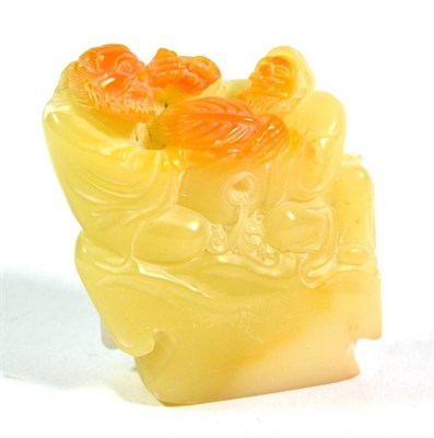 Lot 76 - A Chinese carved jade group of two bearded men sitting beside a vase, 7cm high