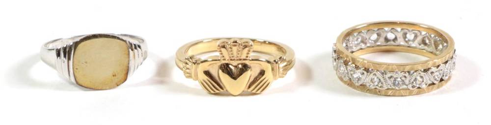 Lot 83 - A 9 carat gold Claddagh ring, finger size N; a 9 carat white gold signet ring, finger size M; and a