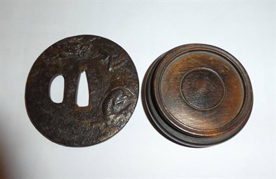Lot 85 - A Japanese Iron Tsuba, Meiji period, cast with mythical beasts, 8cm high; a turquoise head of...