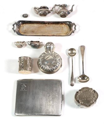 Lot 87 - A miniature silver teaset; a silver cigarette case; a silver cased scent bottle etc