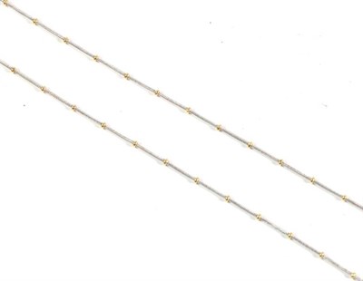 Lot 101 - An 18 carat two colour gold necklace, length 40.5cm