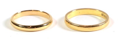 Lot 102 - Two 22 carat gold band rings, P1/2 and S1/2