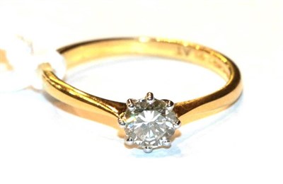Lot 106 - An 18 carat gold solitaire diamond ring, a round brilliant cut diamond in a claw setting, to...