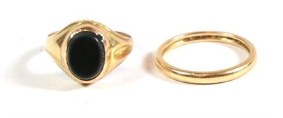 Lot 109 - A bloodstone set signet ring, finger size O1/2; and a band ring, finger size R (2)