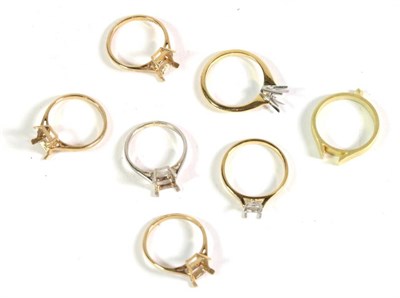Lot 120 - Three 18 carat gold vacant ring mounts, finger sizes N1/2, N1/2 and O; and four 9 carat gold vacant