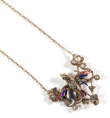 Lot 121 - A nineteenth century rose cut diamond, ruby, garnet and enamel bird pendant, on chain, modelled...