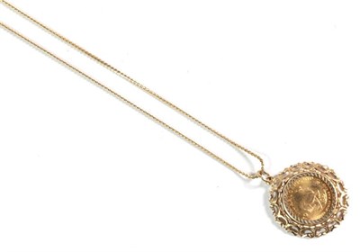 Lot 126 - A 1/10oz Krugerrand dated 1981, in a 9 carat gold mount, on a 9 carat gold fine link chain, pendant