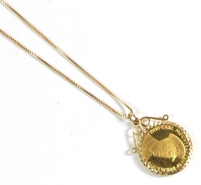 Lot 140 - An Earl Mountbatten of Burma gold coin in mount, on a 9 carat gold fine link chain, pendant...