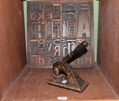 Lot 174 - Art Deco wooden cased printing blocks; and a Victorian seal letter press